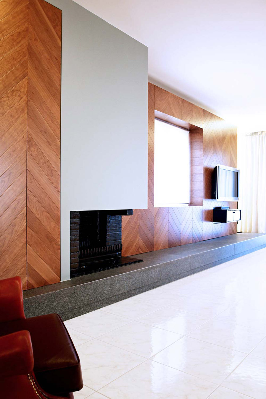 The shell of the existing fireplace was constructed and transformed.
